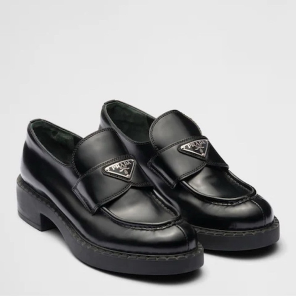 Prada triangle loafers, 37.5 with box and dust covers.